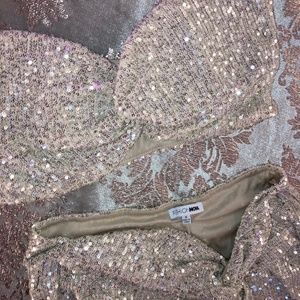 2 piece fashion nova, silver, sparkly  top and skirt set.